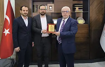 Siirt'te vaiz ve gençlik koordinatörü Mehmet Nafih Baydarman'a veda plaketi