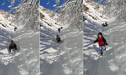 Siirt'te çocuklar karın keyfini böyle çıkardı: Kendi yaptıkları kayaklarla doyasıya eğlendiler