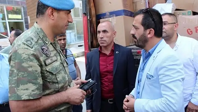 ŞEHİDİN KUZENİNDEN 1 TIR GİYSİ VE GIDA YARDIMI