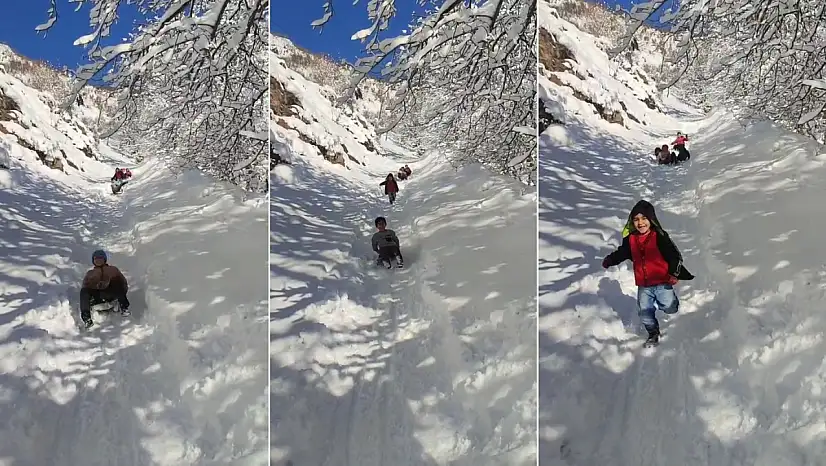 Siirt'te çocuklar karın keyfini böyle çıkardı: Kendi yaptıkları kayaklarla doyasıya eğlendiler